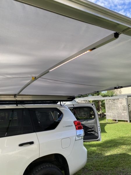 kings tjm roll out awning led curved spread out power pole